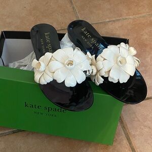 kate spade Black Jelly Thong Sandals with White Floral Appliqués